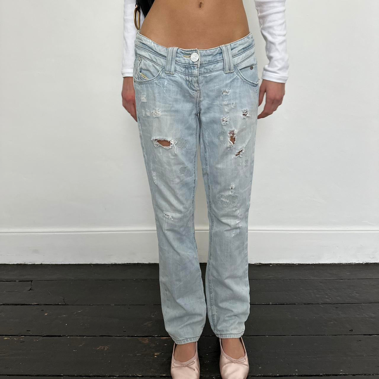 Vintage 2000’s blue distressed bootcut jeans