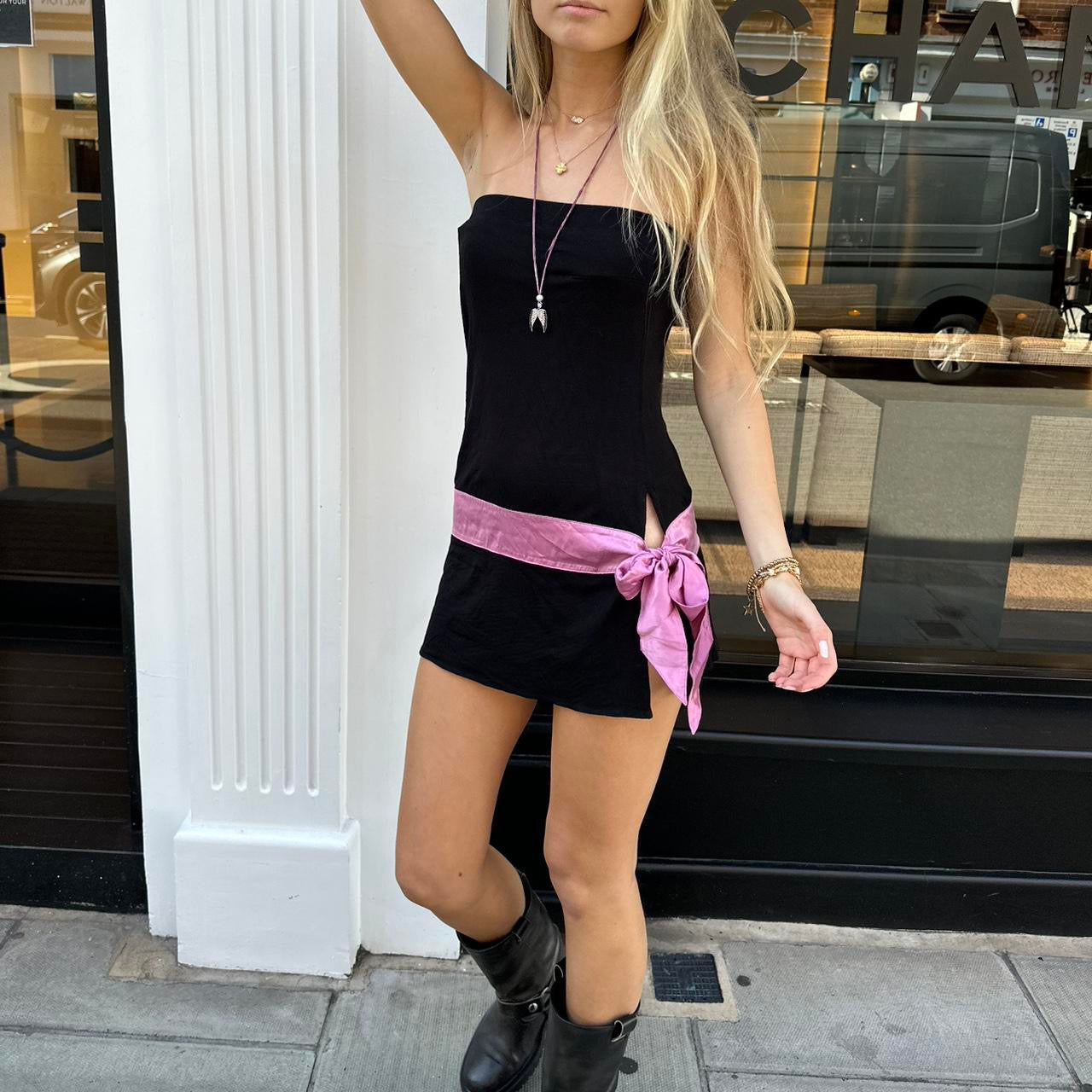 Vintage 2000’s strapless black mini dress with pink bow