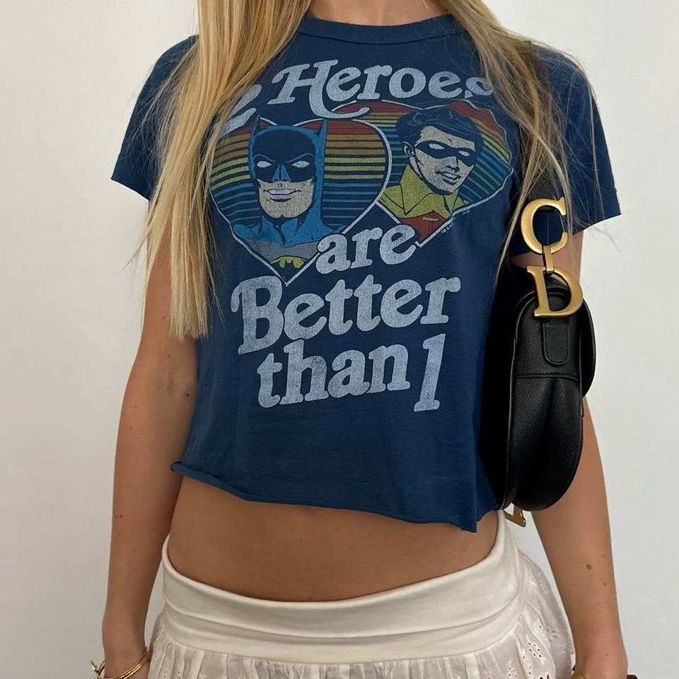 Vintage 2000s graphic ‘ 2 Heroes are better than 1’ baby tee