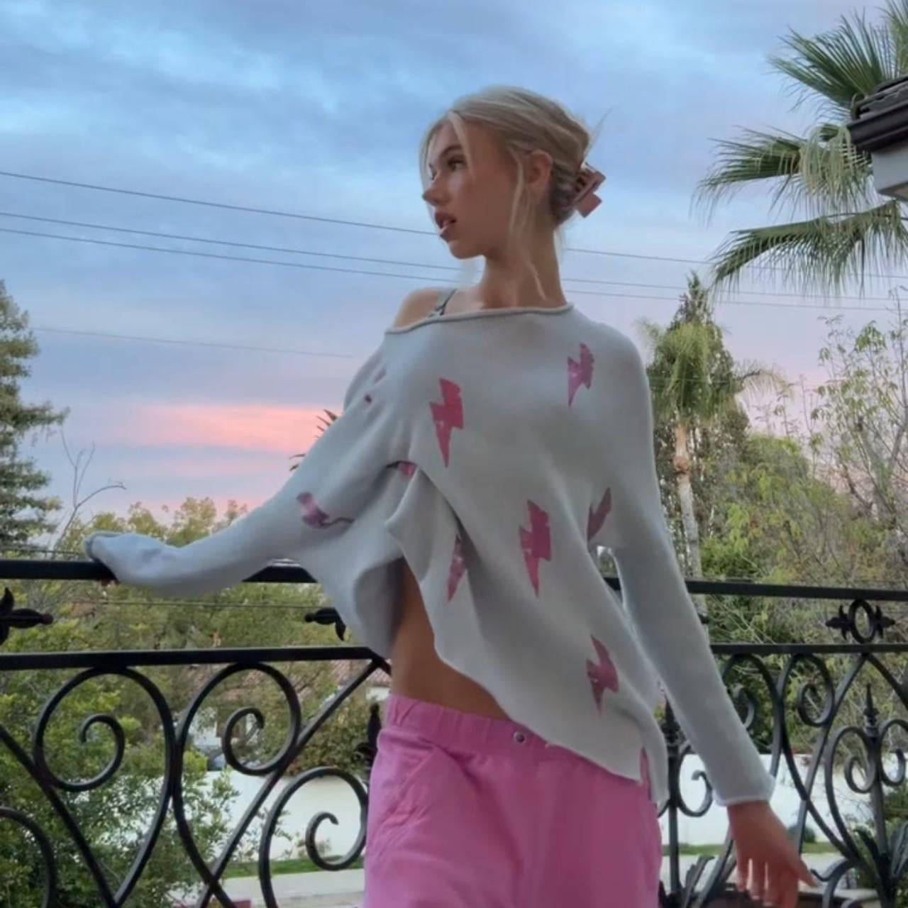 Vintage pink lighting bolt sweater