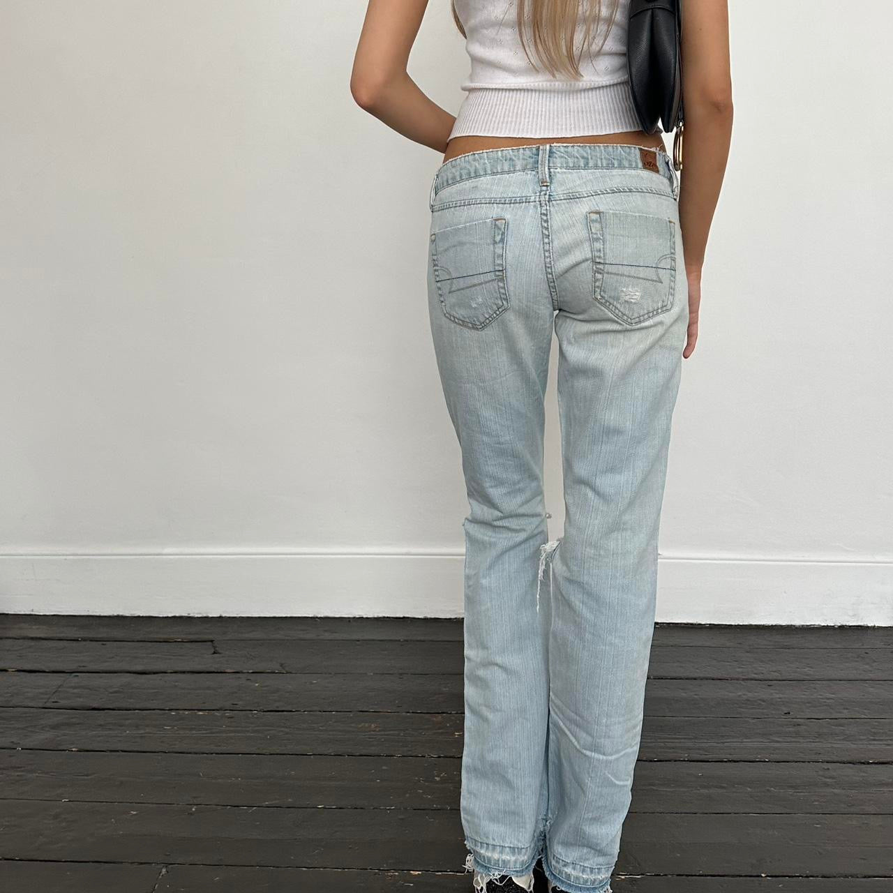 Vintage early 2000s dream fit lightly distressed blue wash jeans