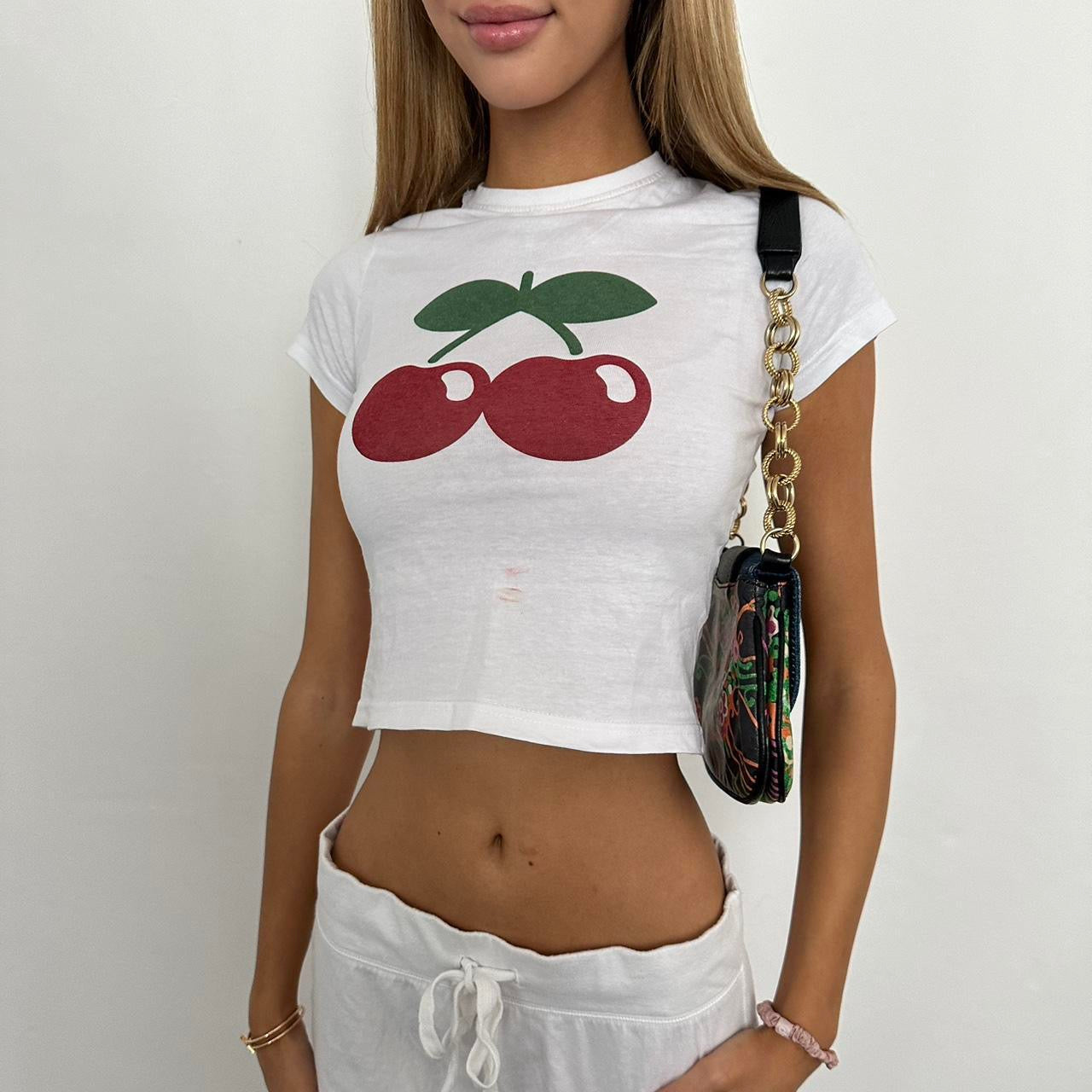 Vintage cherry Ibiza white baby tee š