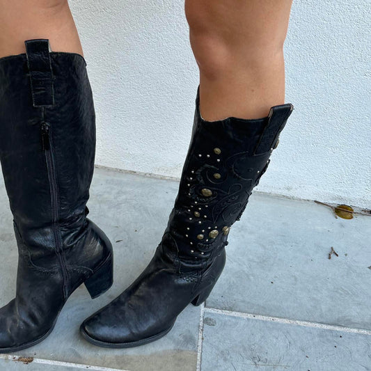 Black leather studded boots with a western vibe