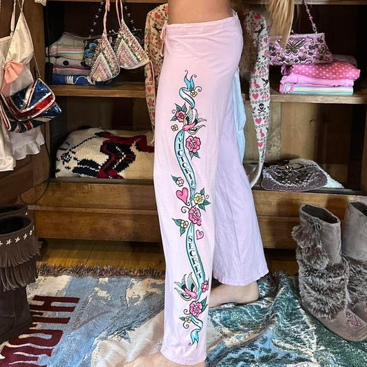 Vintage 2000’s soft pink graphic sweatpants