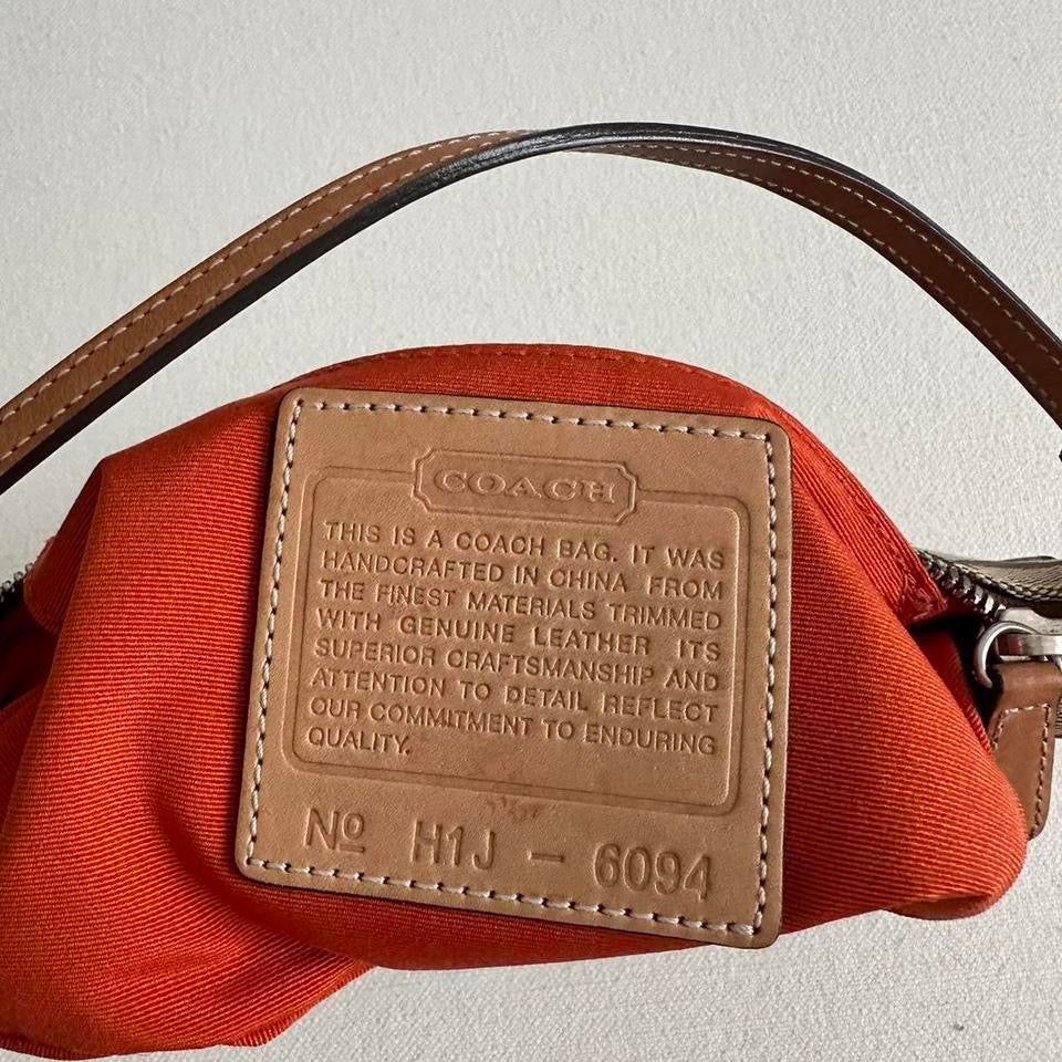 Vintage 90’s Coach monogram small leather bag