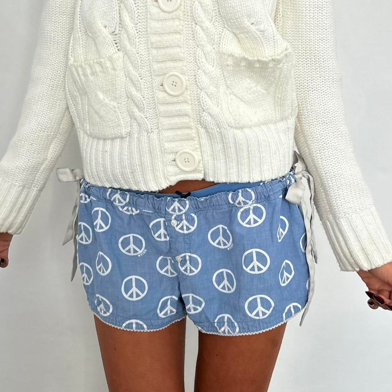 Vintage 2000’s Victoria’s Secret peace sign blue shorts