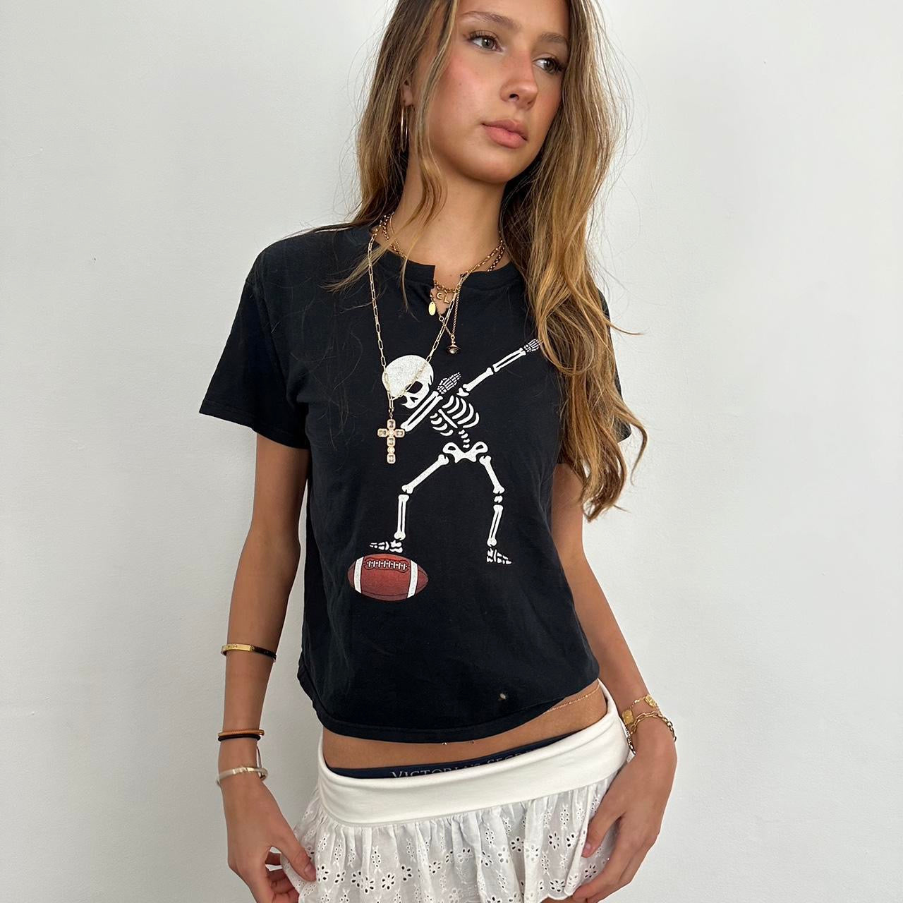 Vintage black skeleton football baby tee