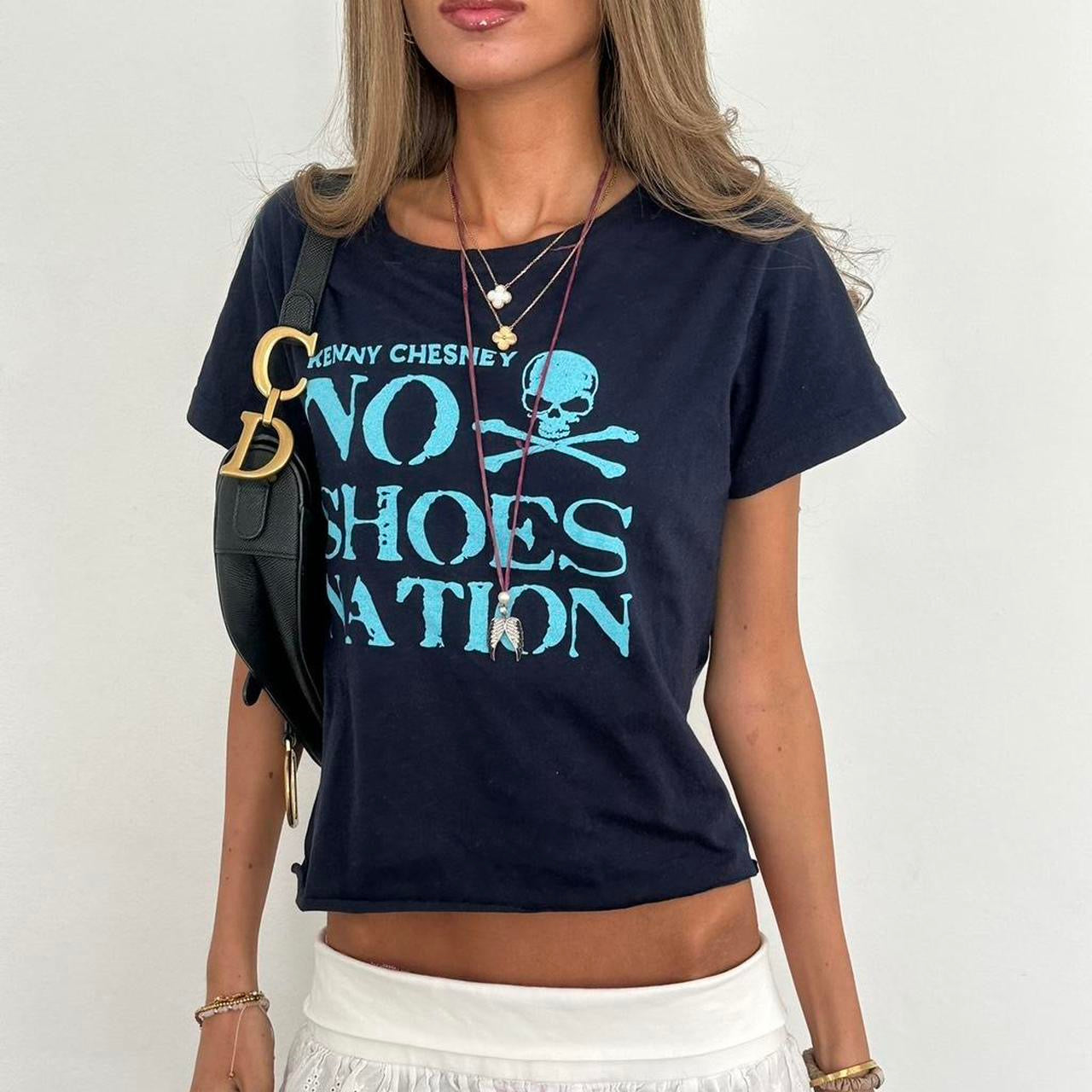 Vintage 00s blue skull and crossbones top