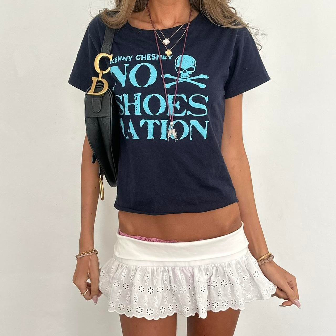 Vintage 00s blue skull and crossbones top