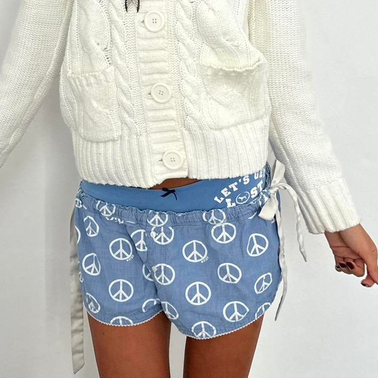 Vintage 2000’s Victoria’s Secret peace sign blue shorts