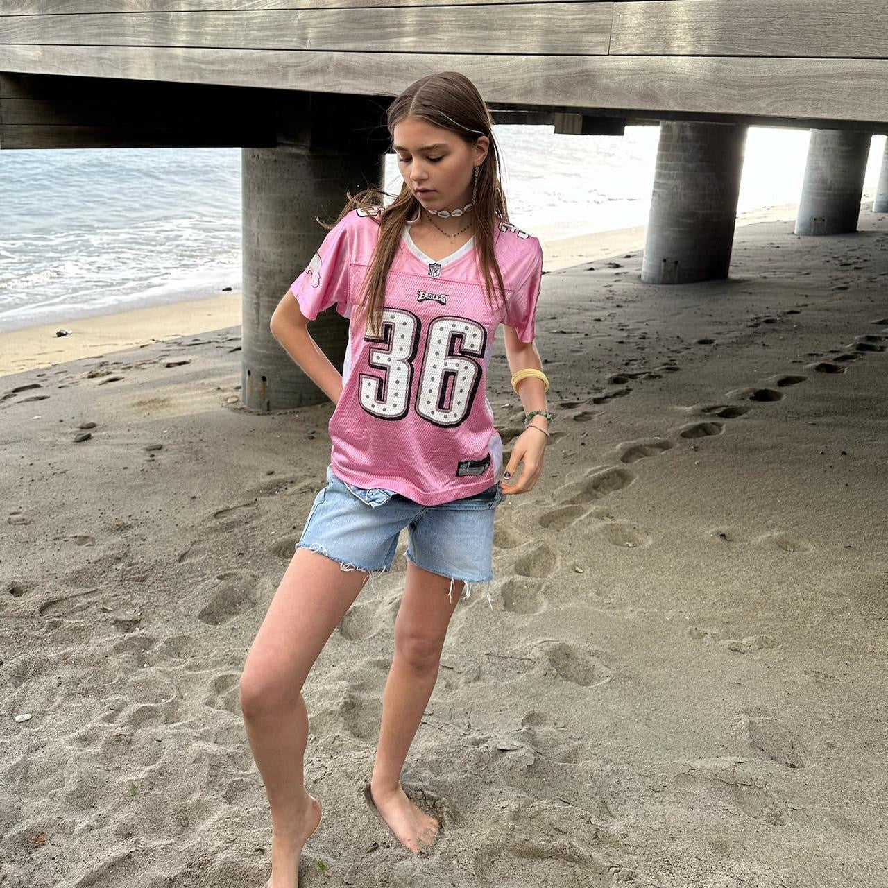 Vintage 90’s pink jersey NFL top