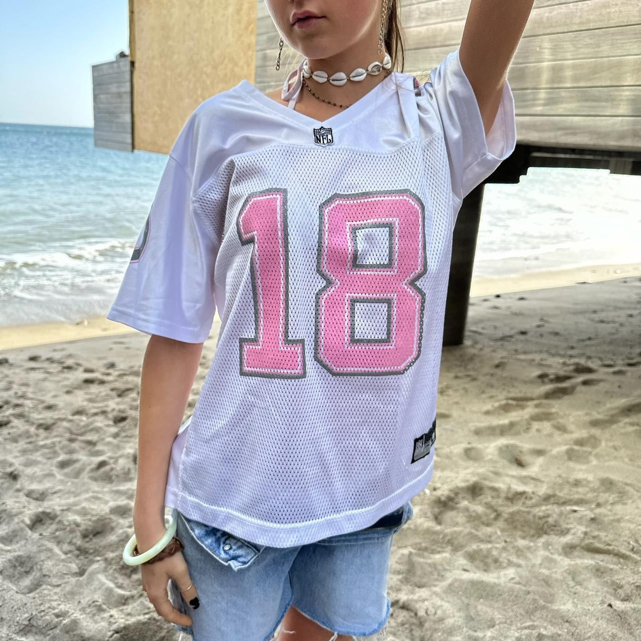 Vintage 90’s pink jersey NFL top