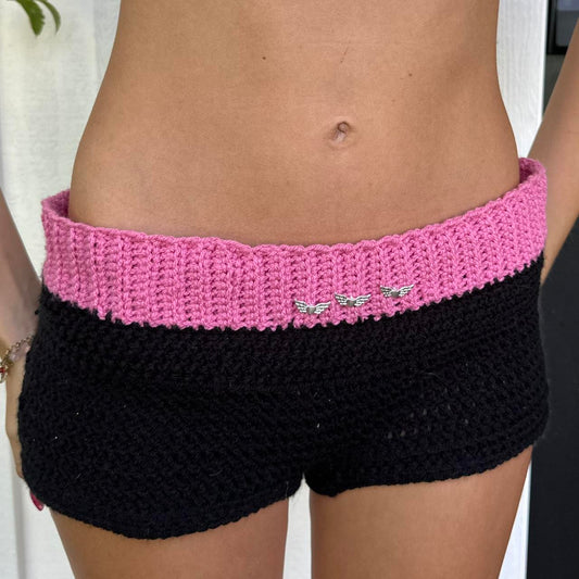 Vintage black and pink knit mini shorts