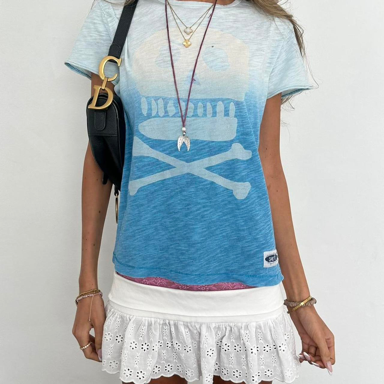 Vintage 00s blue skull and crossbones top