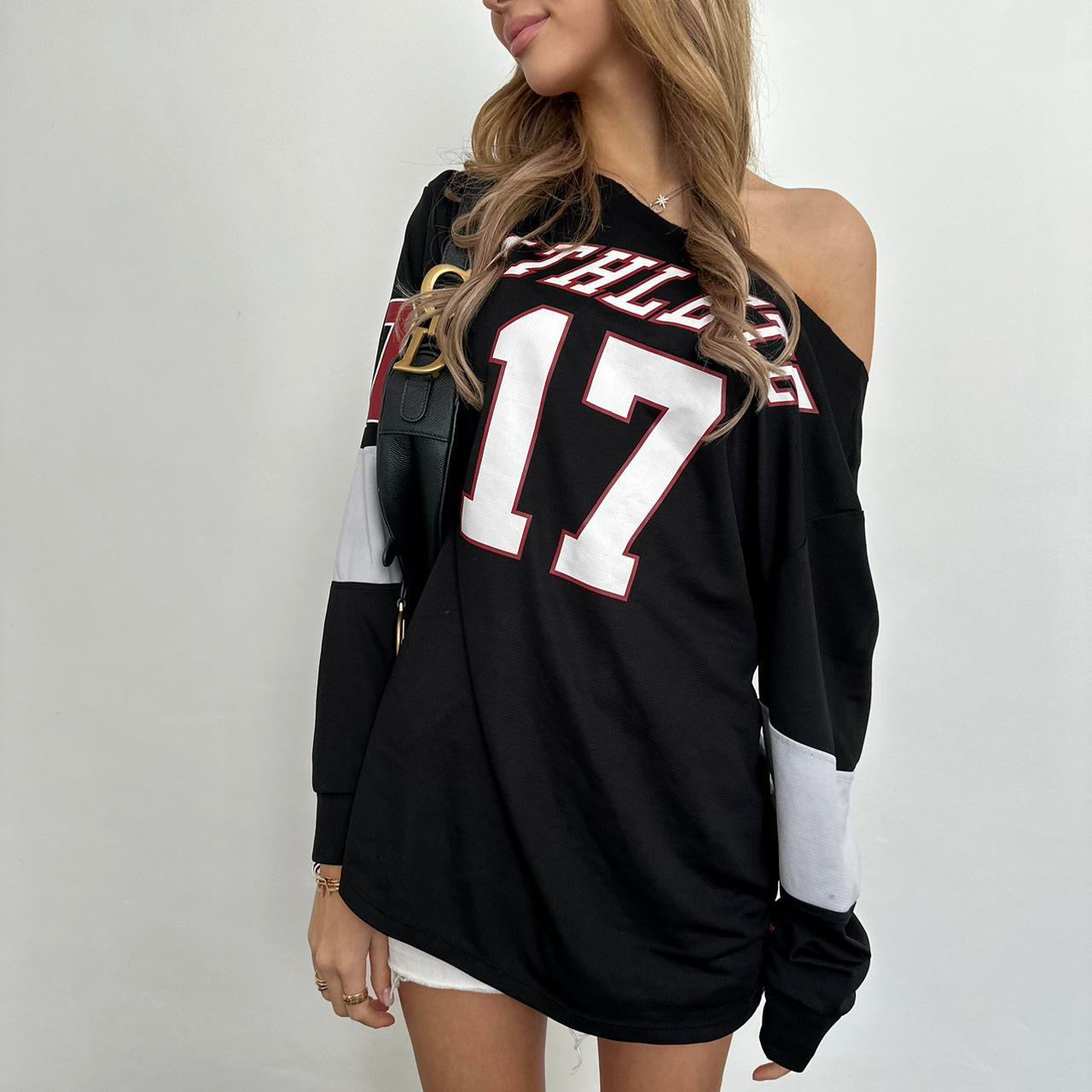 Vintage black graphic off shoulder jersey top