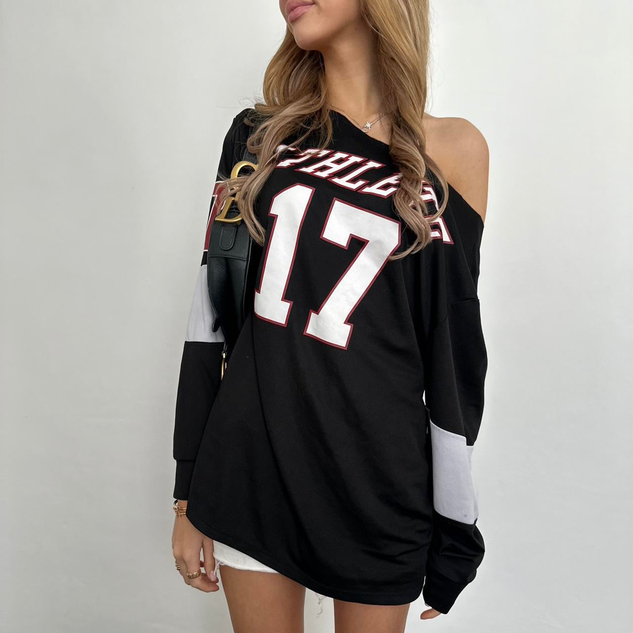 Vintage black graphic off shoulder jersey top