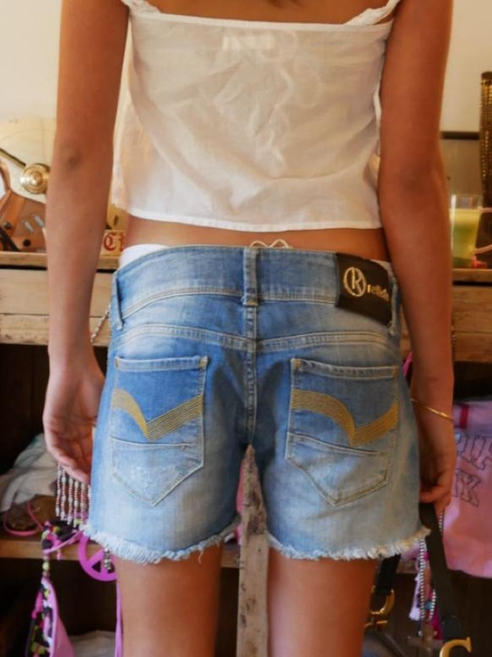 Vintage 00’s skull and crossbones embroidered denim shorts