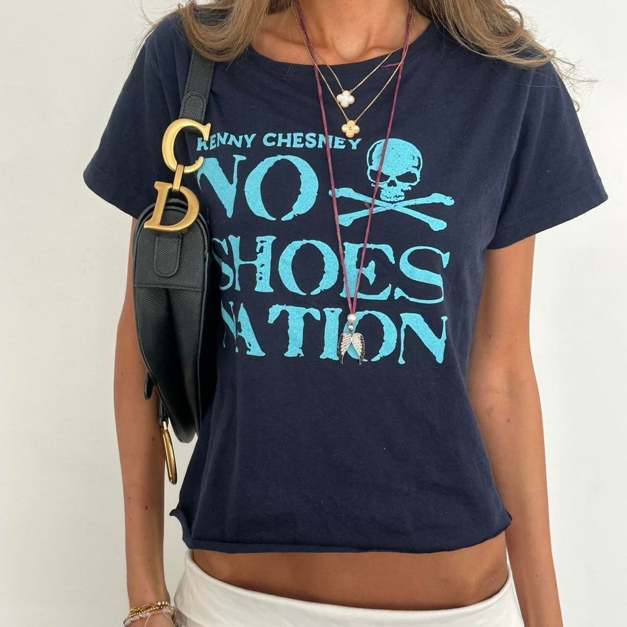 Vintage 00s blue skull and crossbones top