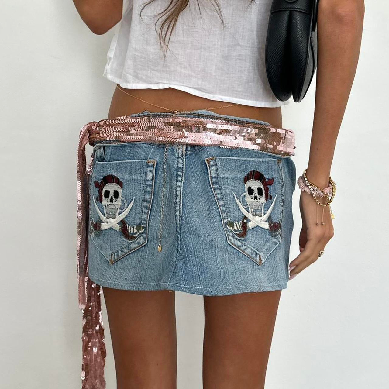 Vintage 00’s skull and cross bones pirate denim mini skirt