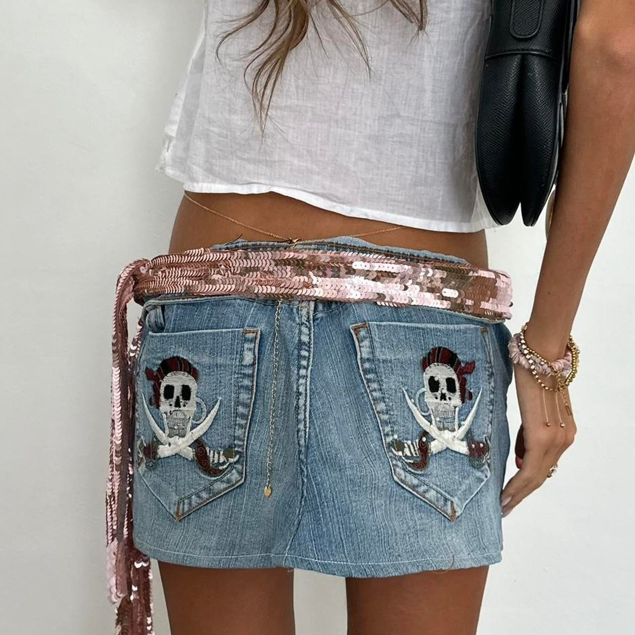 Vintage 00’s skull and cross bones pirate denim mini skirt