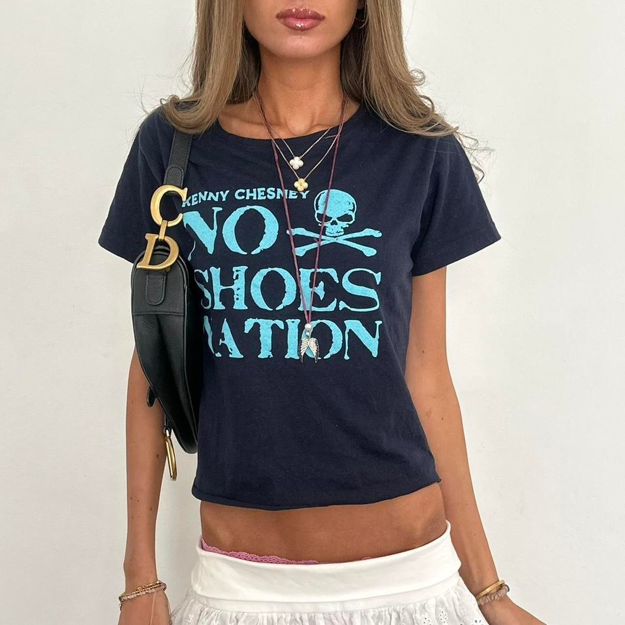 Vintage 00s blue skull and crossbones top