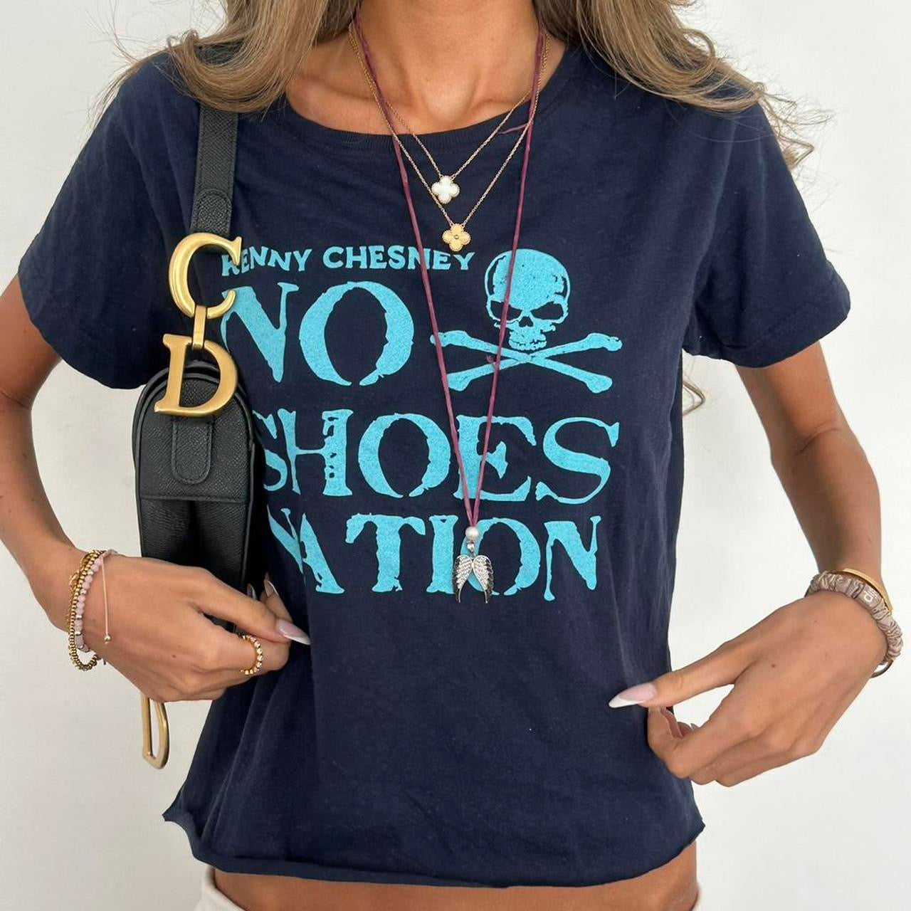 Vintage 00s blue skull and crossbones top