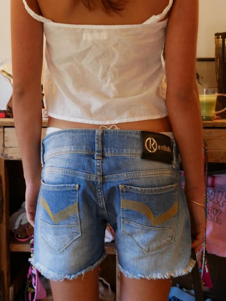 Vintage 00’s skull and crossbones embroidered denim shorts