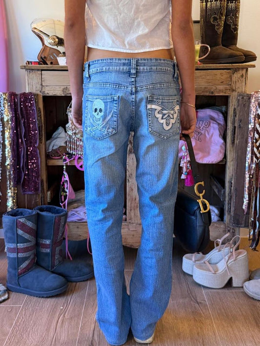 Vintage 00s skull and crossbone embroidered bootcut jeans