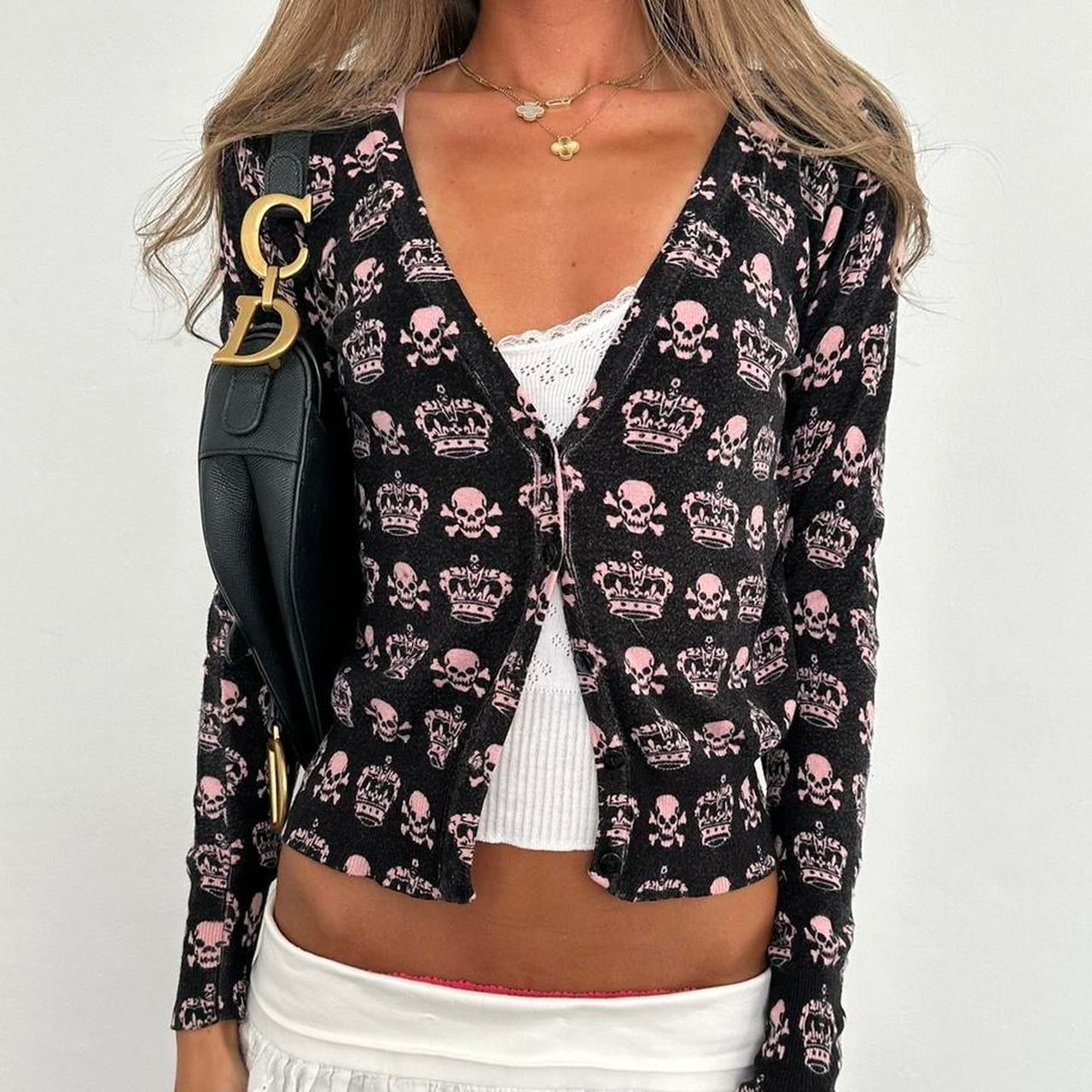 Vintage 90’s pink skull and crossbones cardigan
