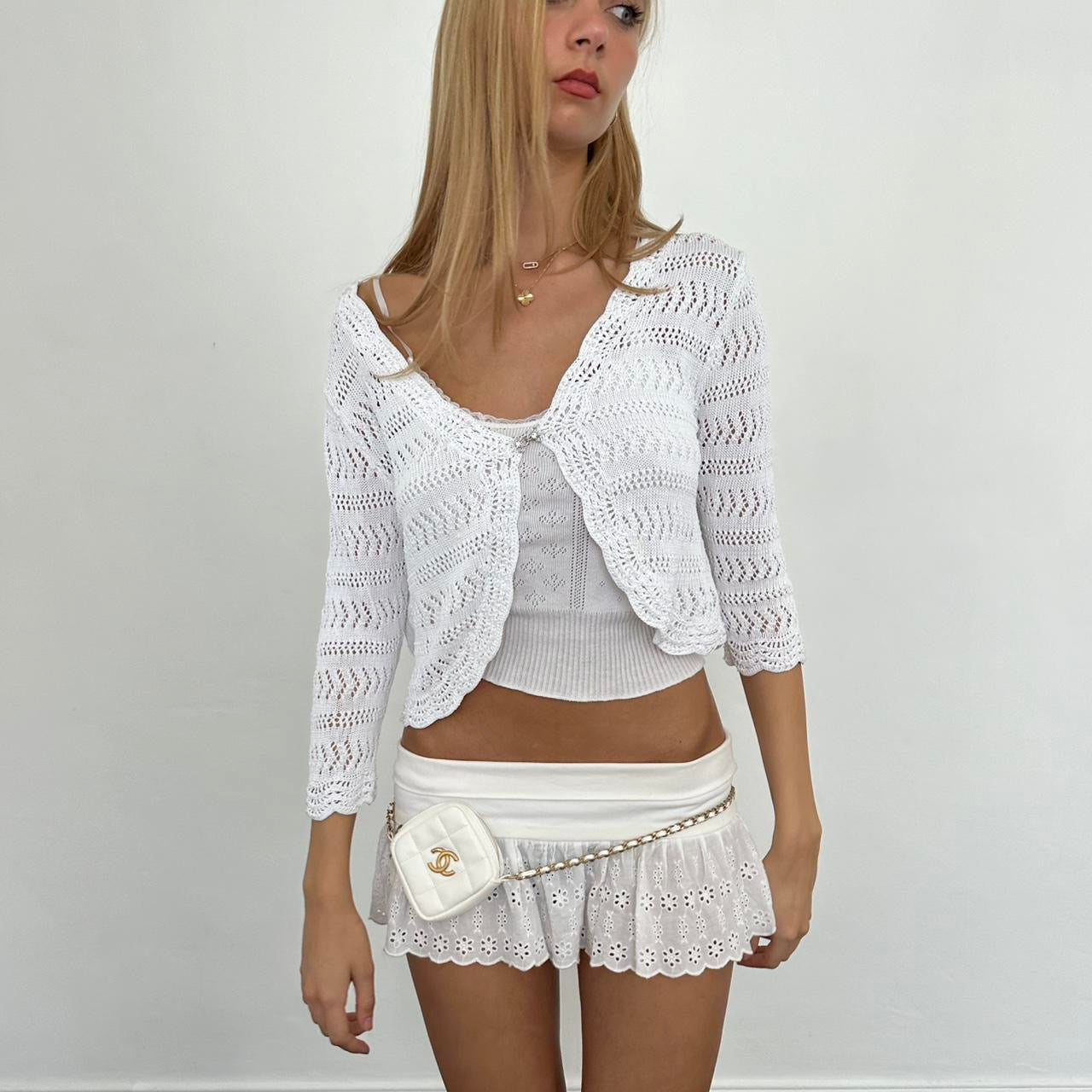 White crochet cardigan with ruffle trim