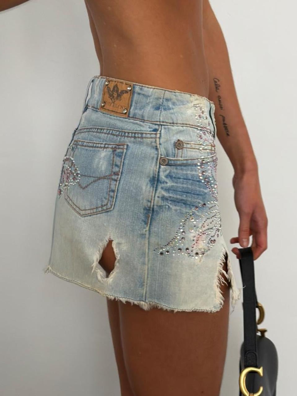 Vintage 00’s butterfly bejewelled distressed denim skirt